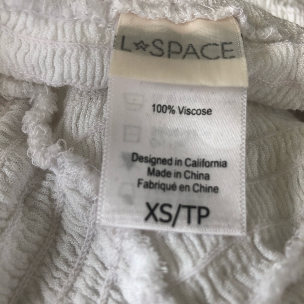 🕊NWOT LSPACE WHITE TIE UP JUMP SUIT WITH SLIT🕊 - Picture 8 of 8